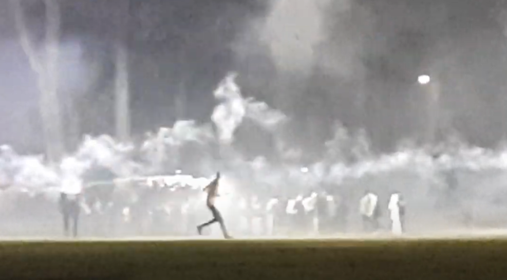 Youth are seen setting off fireworks at South Delta Secondary School on Halloween night. 