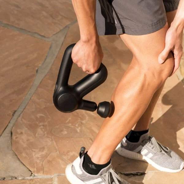 Theragun Percussive Therapy massager.