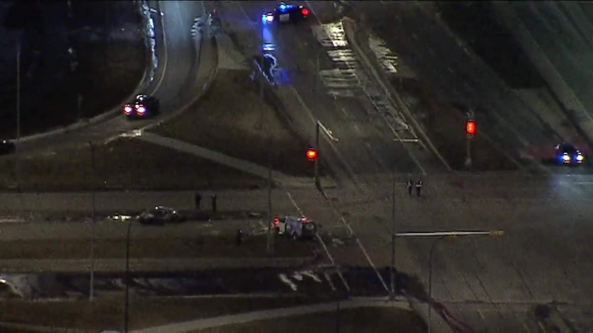 Calgary police closed off the intersection of Métis Trail and Airport Trail on Nov. 25, 2022 after a two vehicle crash sent two to hospital.