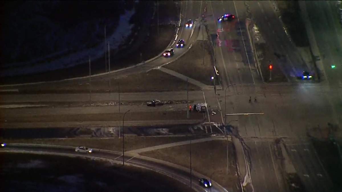 Calgary police closed off the intersection of Métis Trail and Airport Trail on Nov. 25, 2022 after a two vehicle crash sent two to hospital.