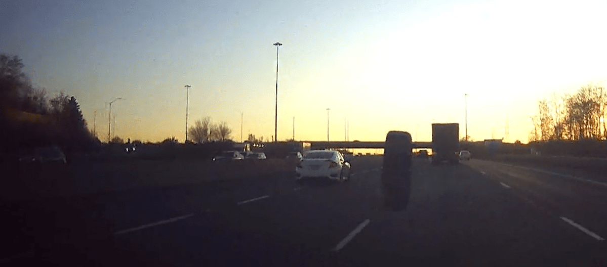 Police say no injuries were reported after a tire struck a vehicle along Highway 403 in Mississauga.