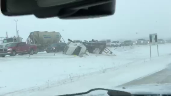 A truck flipped on its side along Highway 2 in central Alberta Saturday, Nov. 5, 2022.