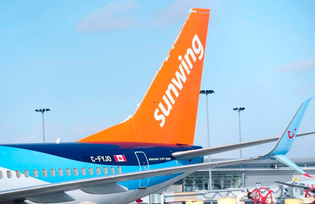 A Sunwing aircraft is parked at Montreal Trudeau airport in Montreal on March 2, 2022.