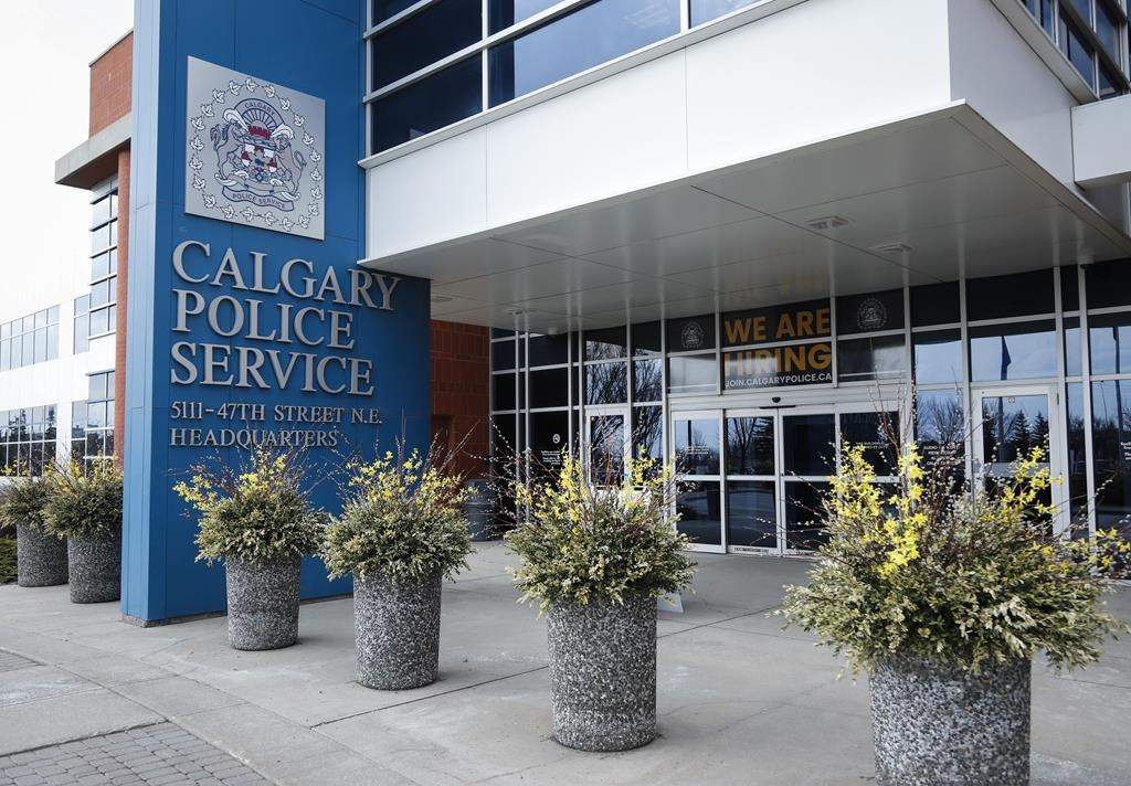 Calgary Police Service headquarters in Calgary, Monday, May 6, 2019. A Calgary business owner specializing in helping seniors and vulnerable people has been charged of defrauding an elderly victim of hundreds of thousands of dollars. THE CANADIAN PRESS/Jeff McIntosh.