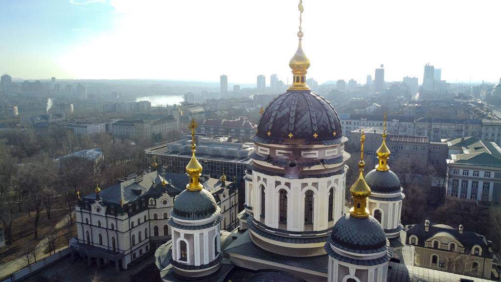 A hole from a shell explosion in the damaged dome of an Orthodox church is seen after what Russian officials in Donetsk said was a shelling by Ukrainian forces, in Donetsk, the capital of Russian-controlled Donetsk region, eastern Ukraine, Thursday, Dec. 15, 2022.