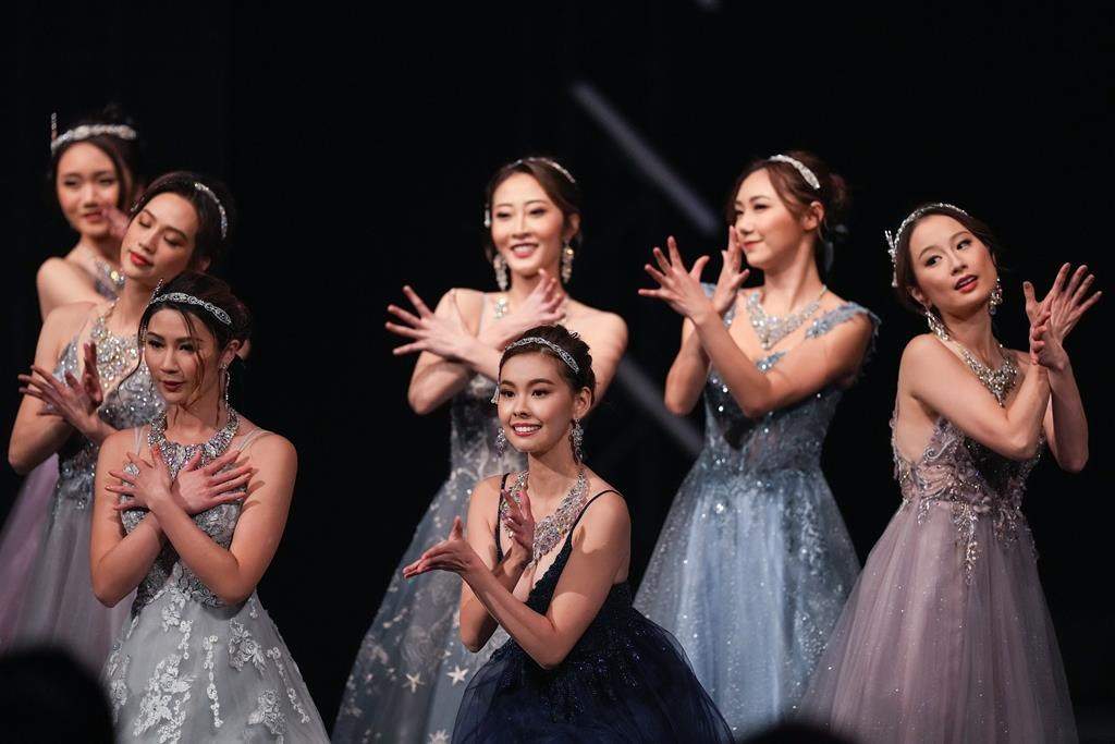Competitors, including eventual winner Yi Yi Wang, front centre, dance during the Miss Chinese Vancouver Pageant, in Richmond, B.C., on Wednesday, November 30, 2022. The popularity of the 27-year-old pageant is testament to both the ongoing lure of celebrity in Hong Kong and Chinese show business, and what one expert calls the "aura" surrounding Canadian Chinese entertainers across the Pacific. Vancouver has long served as a source of talent for the Hong Kong and mainland Chinese entertainment scenes, and the mutual attraction persists in spite of recent political tensions between Canada and Beijing. THE CANADIAN PRESS/Darryl Dyck.