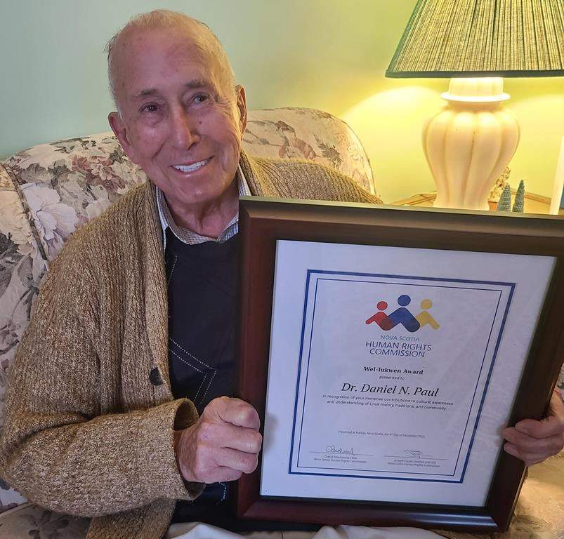 Daniel Paul, shown in this handout image, holds his recently Nova Scotia Human Rights award for furthering Indigenous issues. The latest edition of his Book "We were not the Savages" includes revisions and updates where the Mi'kmaq elder and historian further documents how earlier histories failed to capture the true story of the First Nations struggle against colonialism and racism over the past 400 years.