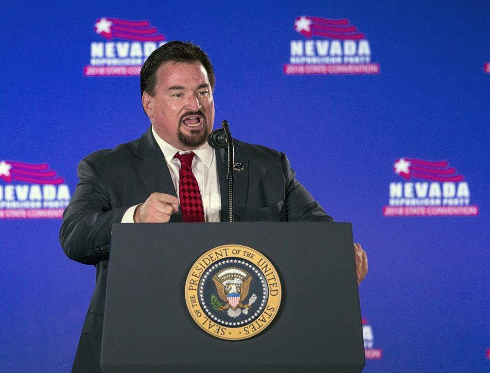 FILE – Nevada State GOP Chairman Michael McDonald announces President Donald Trump before he speaks the Nevada Republican Party Convention at the Suncoast Hotel and Casino Saturday, June 23, 2018, in Las Vegas. New transcripts released on Wednesday, Dec. 21, 2022, by the House Jan. 6 committee reveals Donald Trump and his allies played a direct role in the Nevada Republican Party’s phony elector scheme in 2020. The transcripts show McDonald invoked his Fifth Amendment protection 275 times when he was interviewed in February. (AP Photo/L.E. Baskow, File)