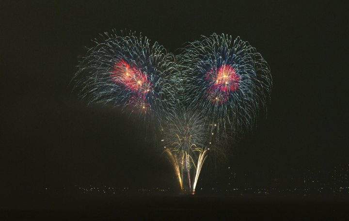 Fireworks explode during New Year celebrations in Toronto on Jan. 1, 2022.