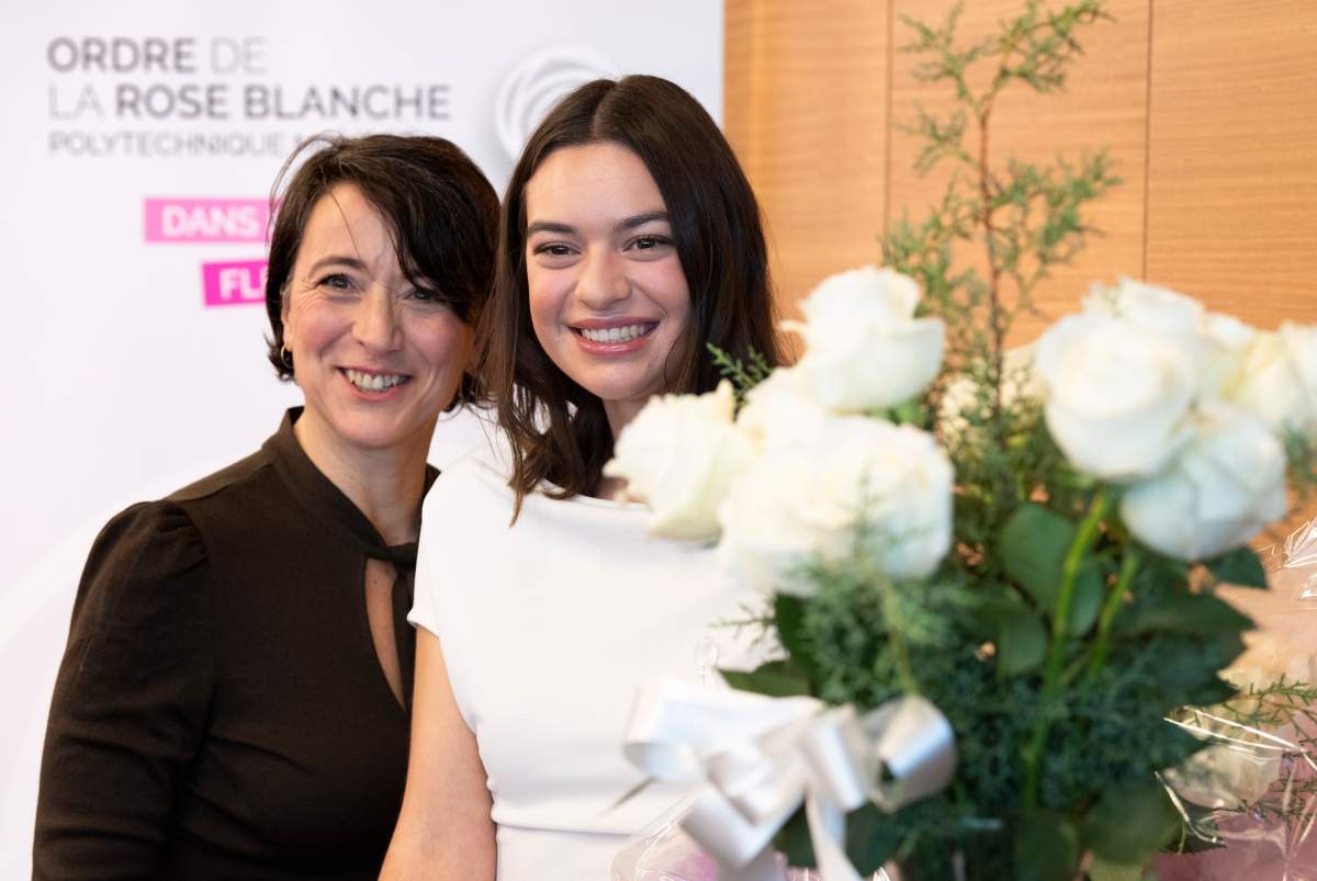 Sophia Roy, a Quebec environmental engineering student, poses with Polytechnique survivor Nathalie Provost after receiving the Order of the White Rose scholarship in Montreal, on Monday, December 5, 2022. 