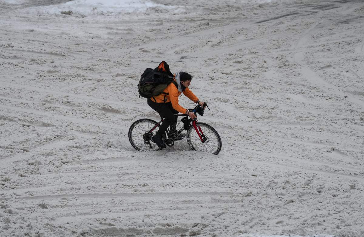 Person biking in snow