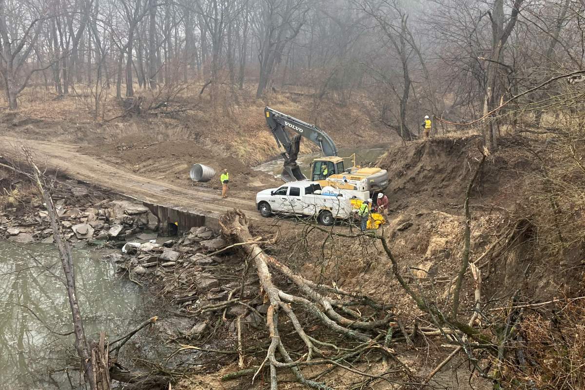 Washington County Road Department constructs an emergency dam to intercept an oil spill after a Keystone pipeline ruptured at Mill Creek in Washington County, Kanas, on Thursday, Dec 8, 2022.