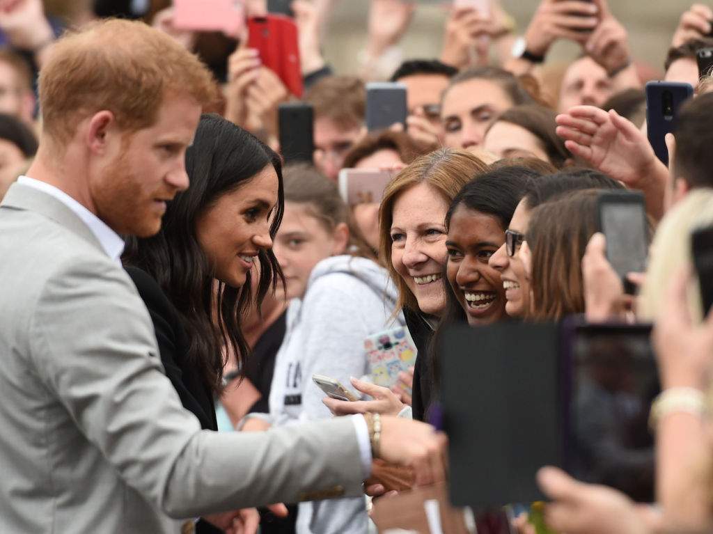 The Duke and Duchess of Sussex on a walkabout at Trinity College during their visit to Dublin, Ireland.