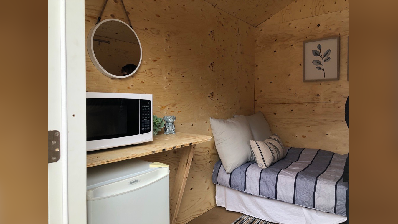 An inside look at a tiny cabin for Hamilton’s homeless residents. The temporary home was unveiled in front of Christ’s Church Cathedral on James Street North in April 2022.