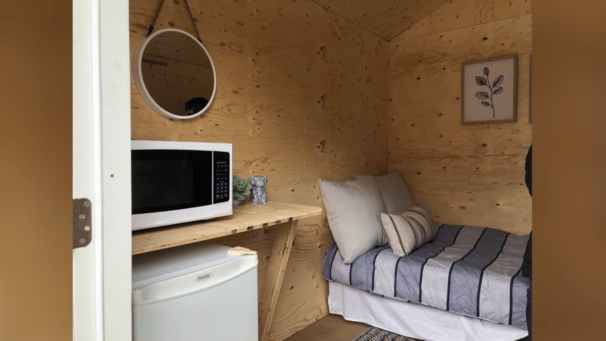 An inside look at a tiny cabin for Hamilton's homeless residents. The temporary home was unveiled in front of Christ's Church Cathedral on James Street North in April 2022.