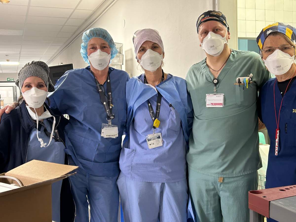 A group of Canadian volunteers pose for the camera in a Polish hospital.