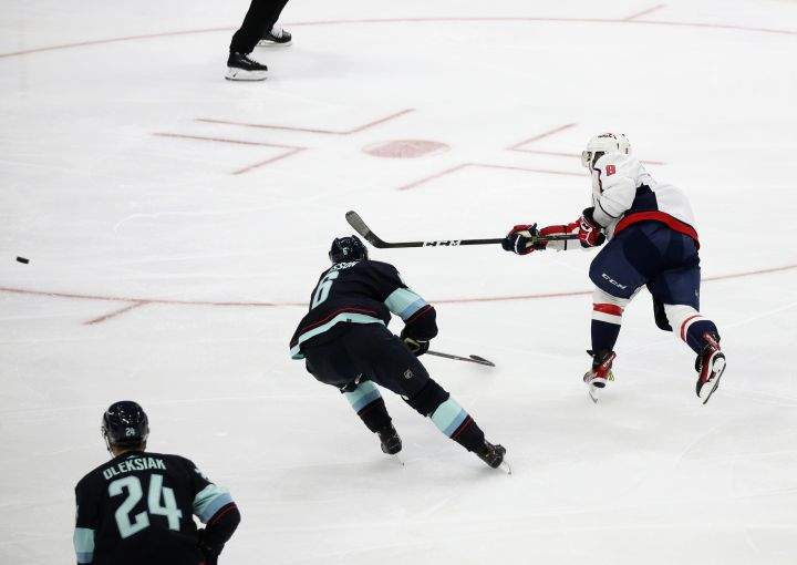 Washington Capitals left wing Alex Ovechkin (8) scores a goal against the Seattle Kraken during the third period of an NHL hockey game, Sunday, Nov. 21, 2021, in Seattle. The Seattle Kraken beat the Washington Capitals 5-2.