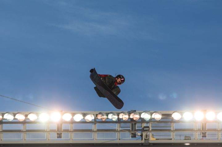 Cameron Spalding of Canada makes his jump in The Style Experience FIS Snowboard Big Air World Cup qualifiers in Edmonton on Friday, December 9, 2022.