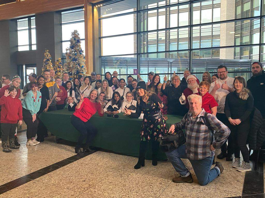 Some of the volunteers and chefs who donated cookies and their time to the third Global Calgary holiday cookie sale on Dec. 1, 2022.