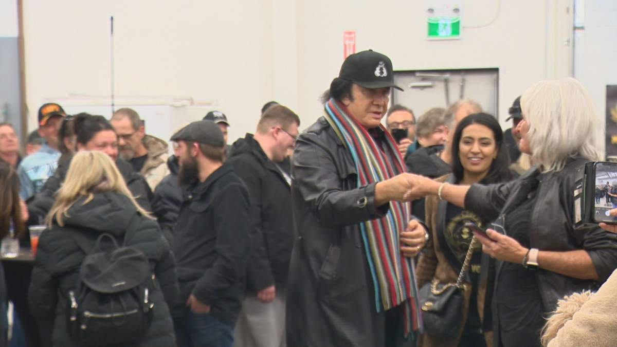 Gene Simmons walking into Minhas Sask, Dec 11th, 2022.