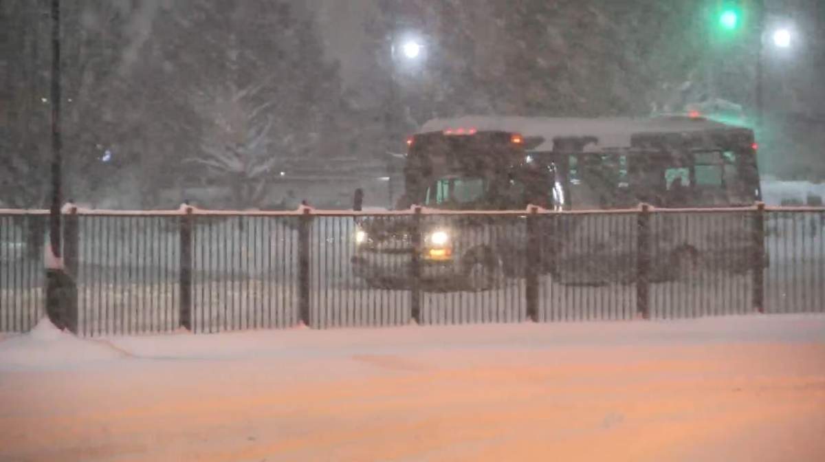 A TransLink bus seen in heavy snow in 2022.