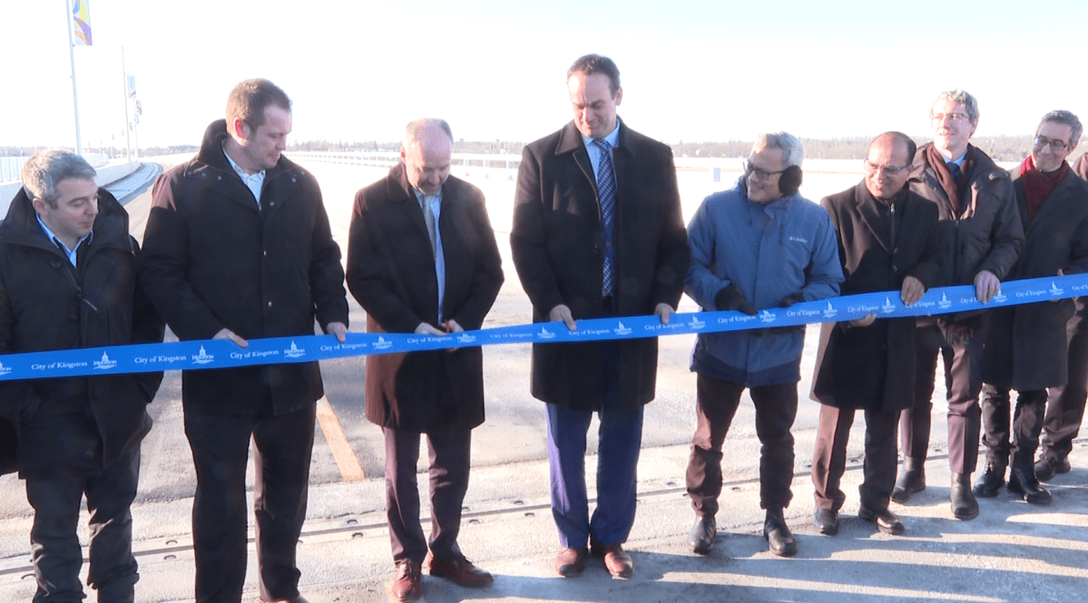 Dignitaries cut the ribbon to open Kingston's Waaban Crossing.