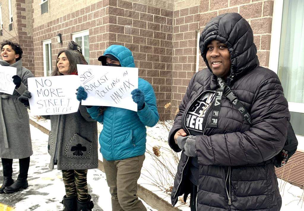 Kayla Borden (far right) attends a demonstration prior to Halifax Regional Police Chief Dan Kinsella (not pictured) testifying at a police review board hearing on Thursday January 5, 2023 in Halifax. THE CANADIAN PRESS/Michael Tutton .