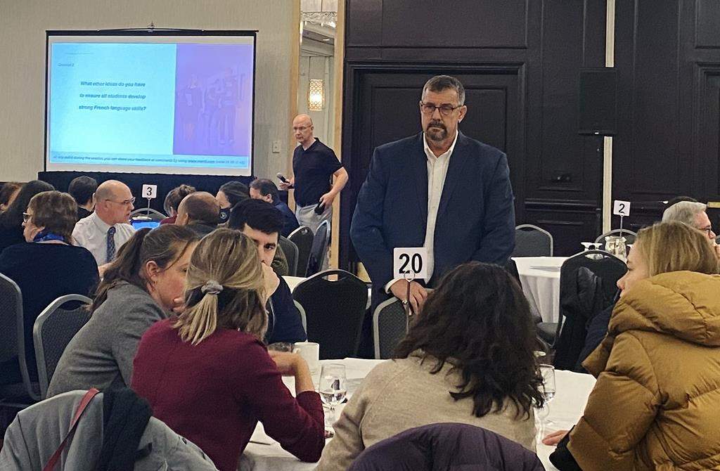 New Brunswick Education Minister Bill Hogan listens to people at the Delta Fredericton on Wednesday, Jan. 25, 2023, during a public consultation for the government’s proposed French immersion program.