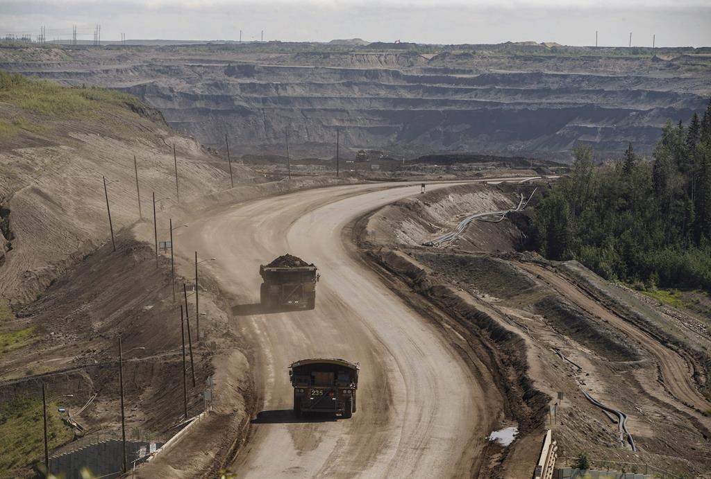 A heavy hauler truck transports in the oilsands in Fort McMurray Alta, on June 13, 2017. 