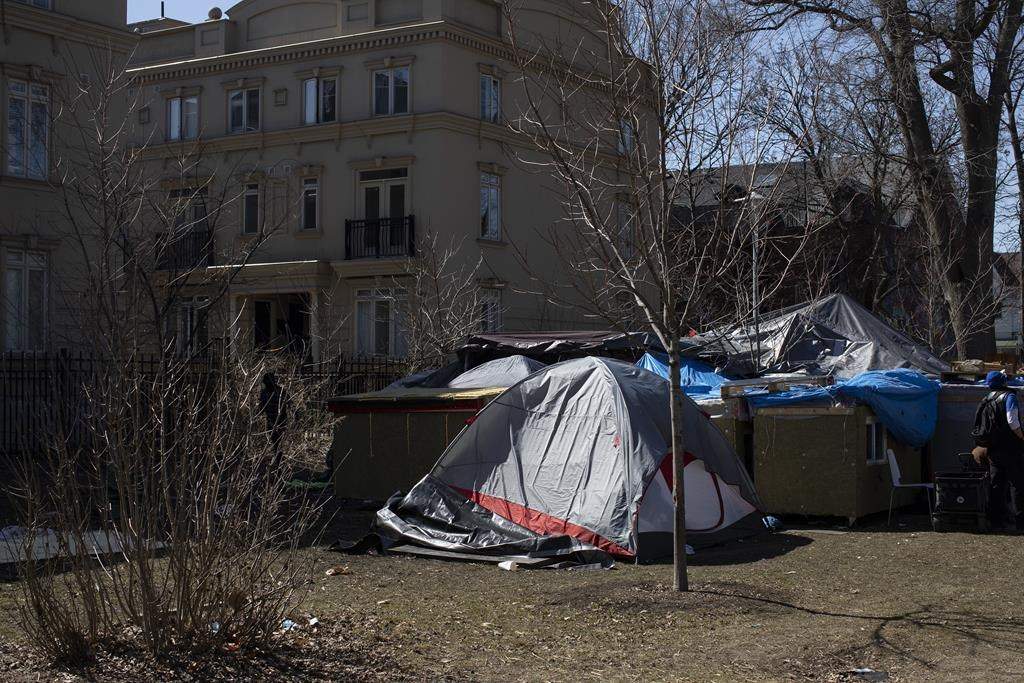 Experts say Ontario cities that move to evict homeless encampments can expect to see a wave of legal challenges after a precedent-setting ruling. A homeless encampment in Toronto's Alexandra Park on Sunday, March 20, 2021. 