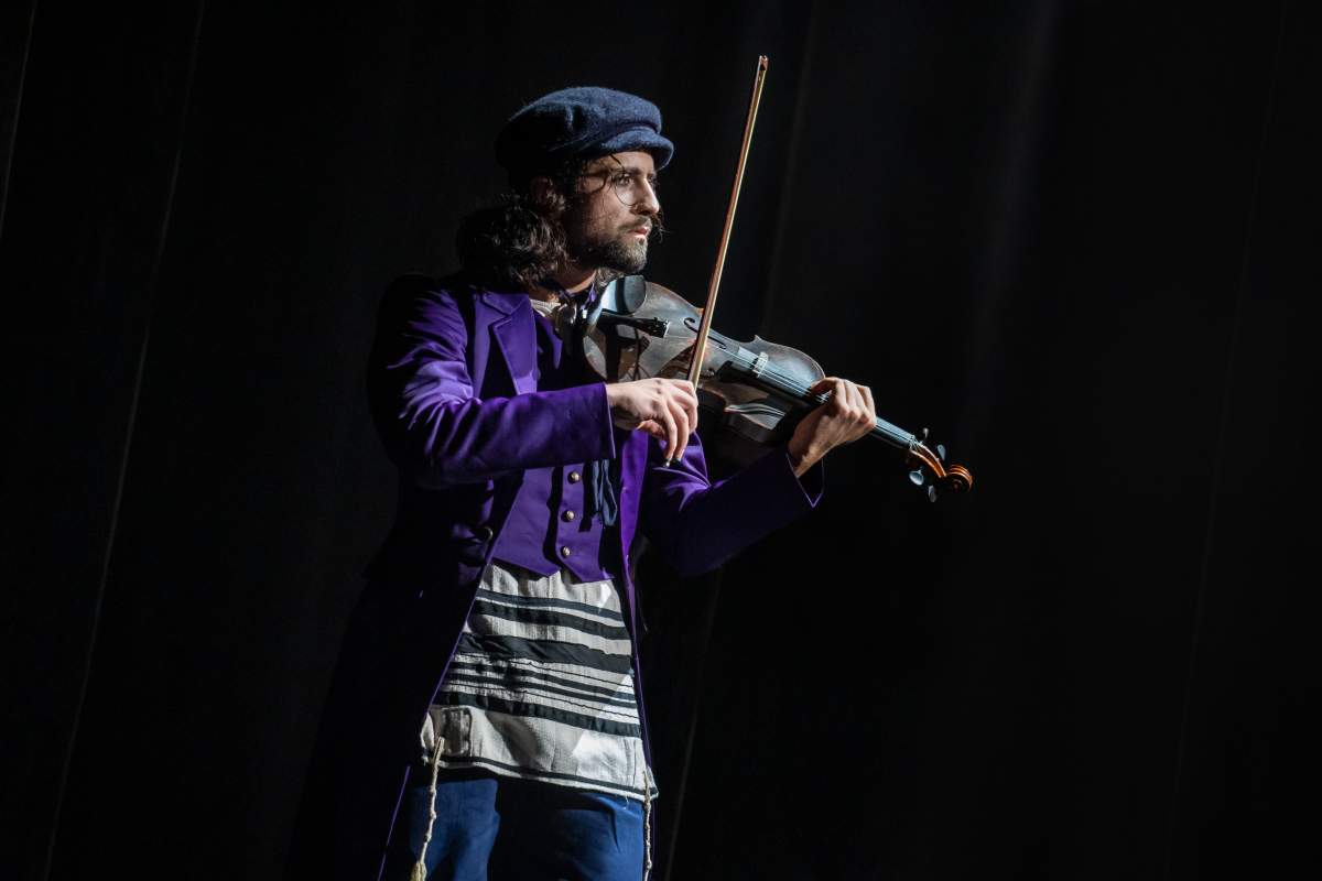 Ali Arian Molaei (The Fiddler) and the Company of the North American Tour of Fiddler on the Roof.