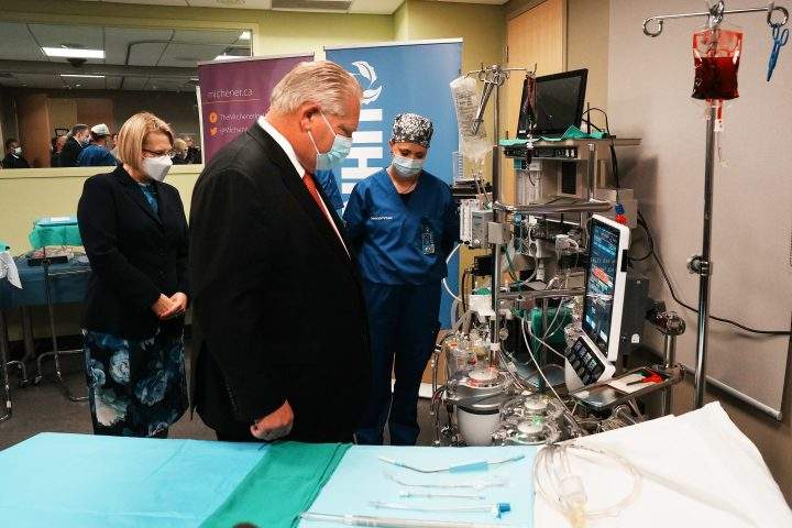 Ontario Premier Doug Ford and Health Minister Sylvia Jones attend a photo opportunity with healthcare workers at before a news conference at the Michener Institute of Education in Toronto, Thursday, Dec. 1, 2022. 