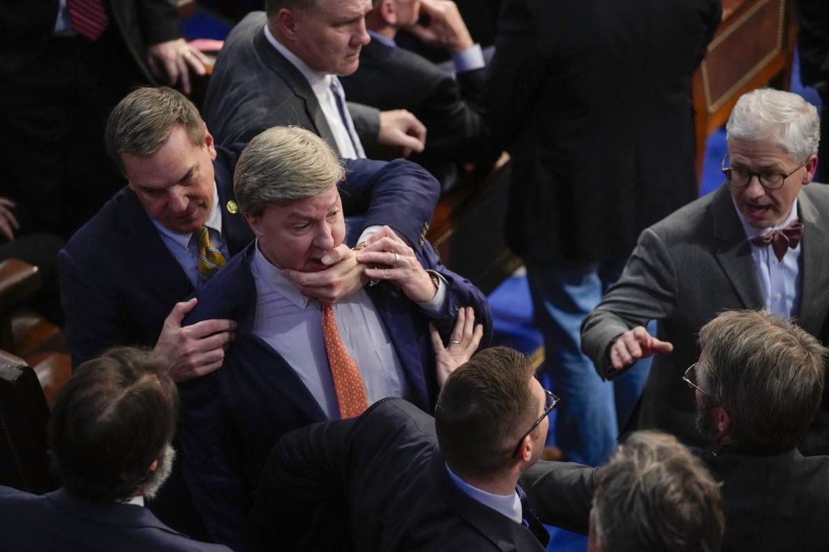 Rep. Richard Hudson, R-N.C., left, pulls Rep. Mike Rogers, R-Ala., back as they talk with Rep. Matt Gaetz, R-Fla., and other during the 14th round of voting for speaker as the House meets for the fourth day to try and elect a speaker and convene the 118th Congress in Washington, Friday, Jan. 6, 2023. At right is Rep. Patrick McHenry, R-N.C. (AP Photo/Andrew Harnik)