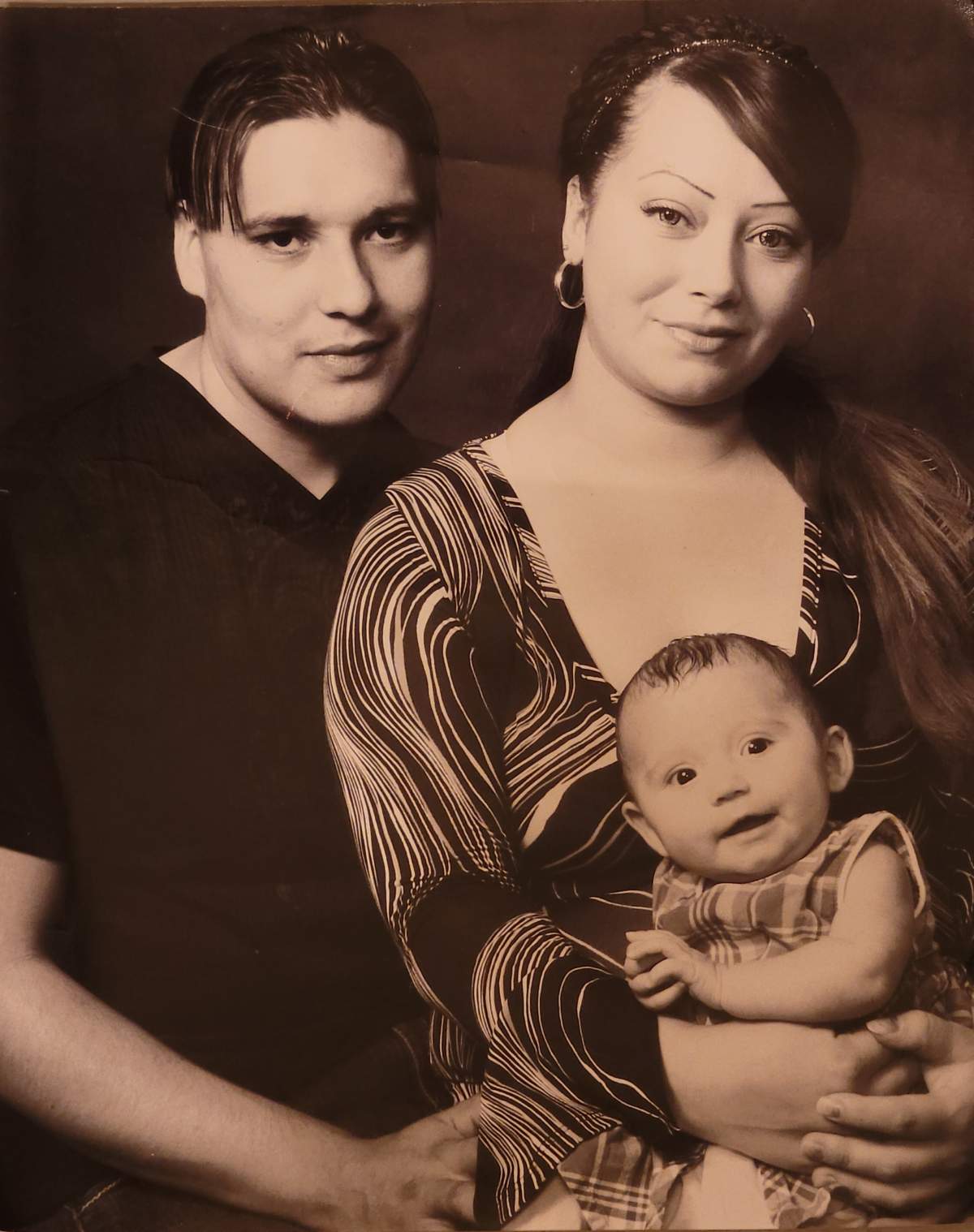 Ross Gladue, his former partner Desiree Kenney and their daughter in an undated photo.