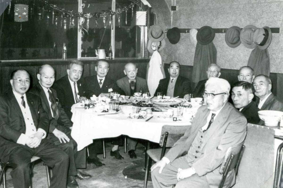 Diners enjoying a meal on the mezzanine level of the original Ho Ho Restaurant.