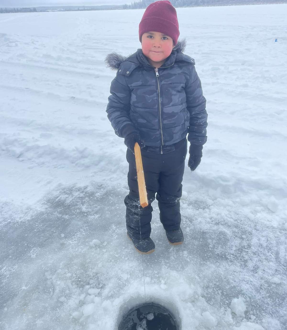 Land-based educator in Sask. school introduces students to ice fishing - image