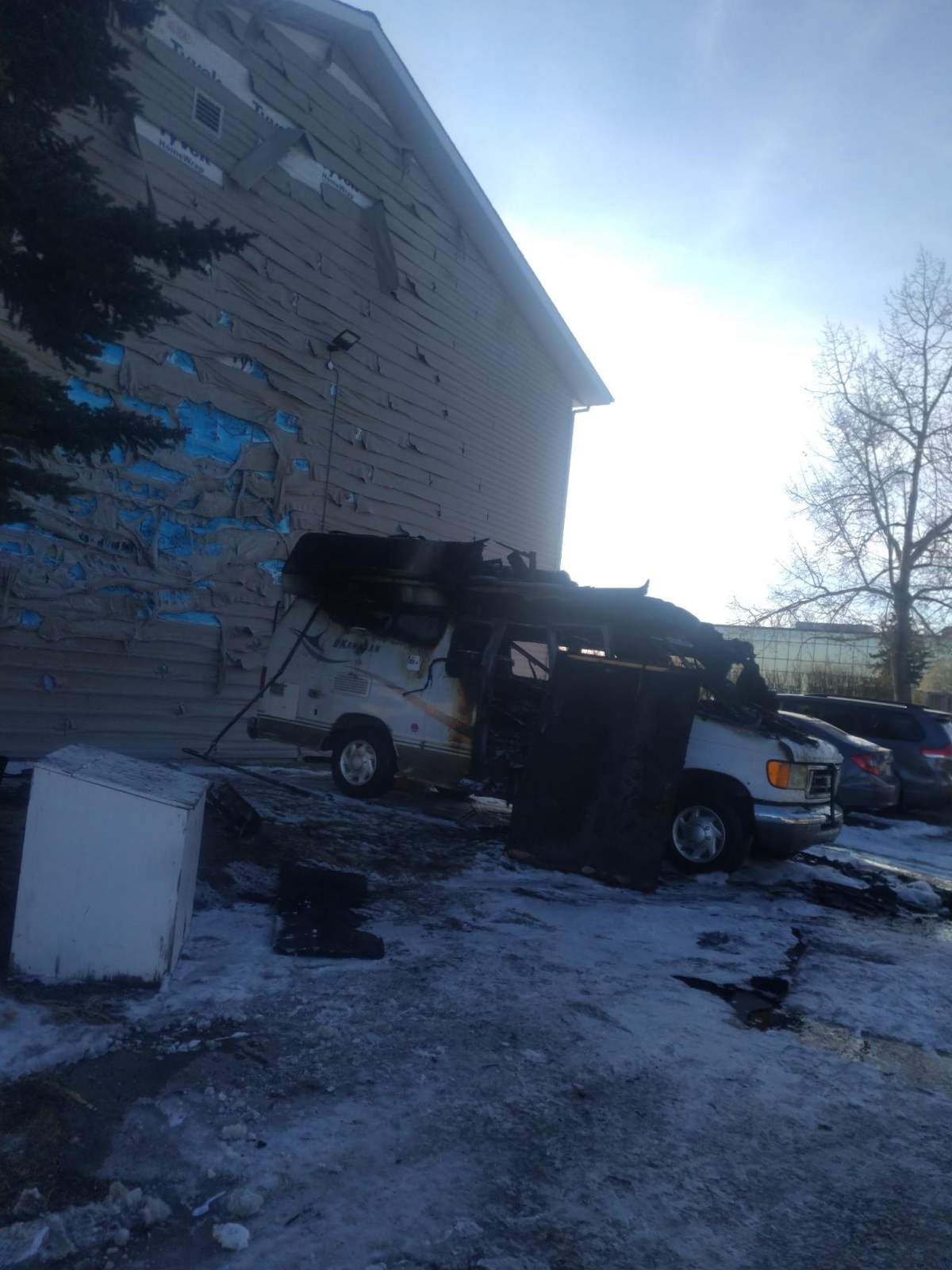 The aftermath of a van fire in the Albert Park/Radisson Heights neighbourhood is pictured on Jan. 11, 2023.