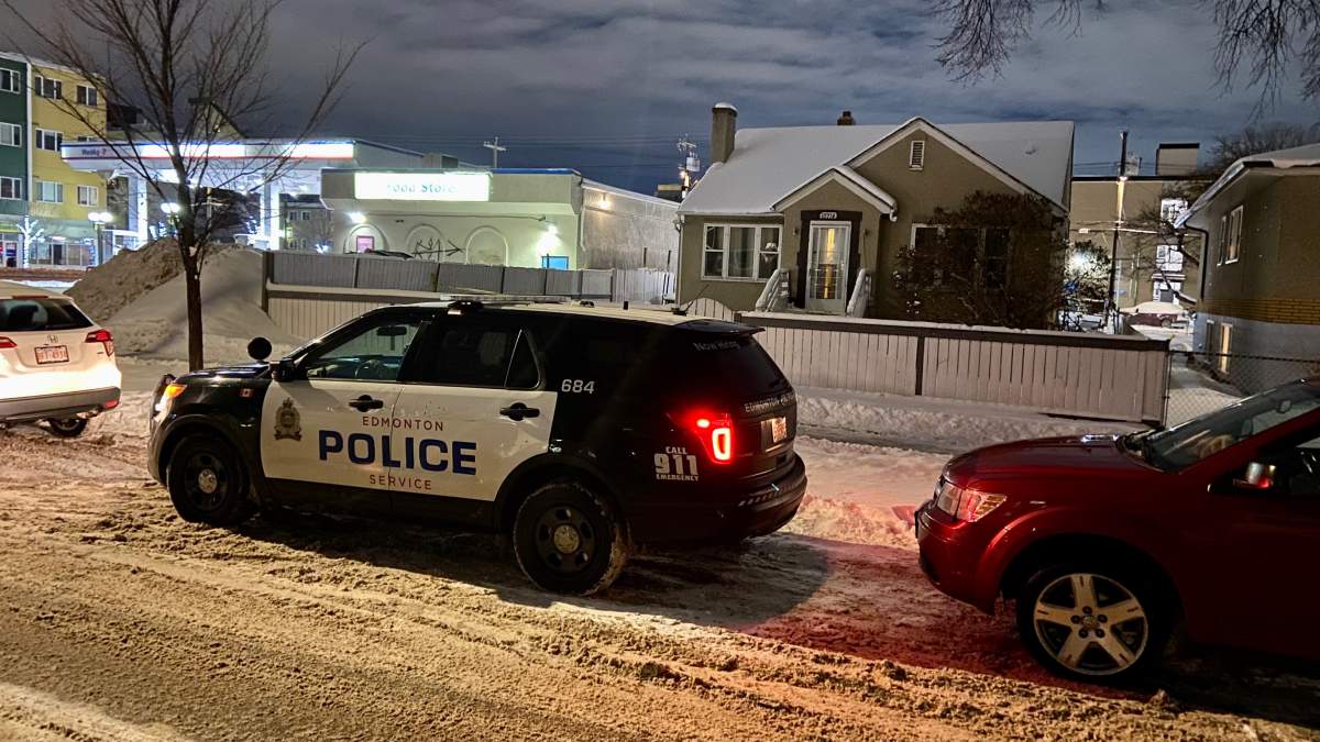 Edmonton police at the scene of a suspicious death near 107 Avenue and 106 Street in downtown Edmonton, Jan. 1, 2023.