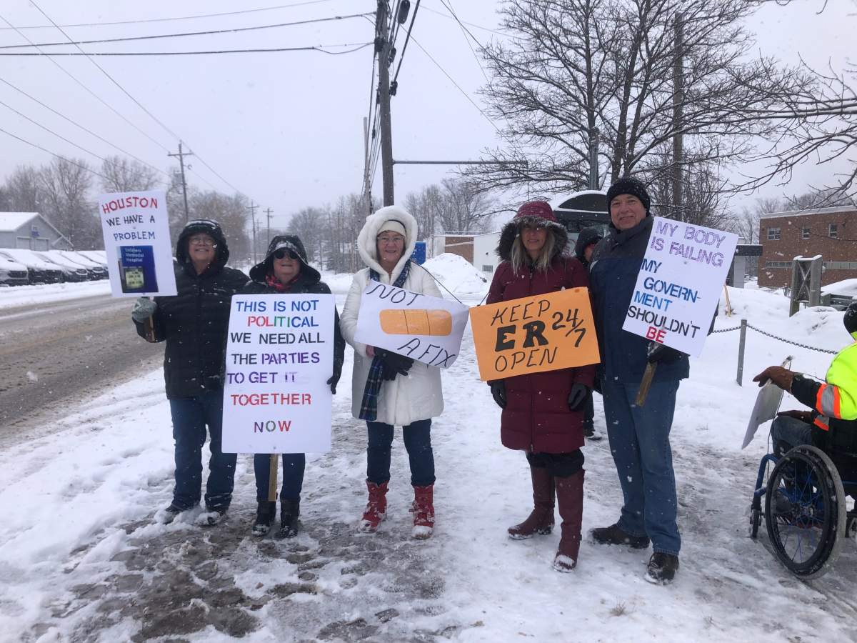 One resident’s sign called on all Nova Scotia parties to work together to find a solution to the health-care crisis.
