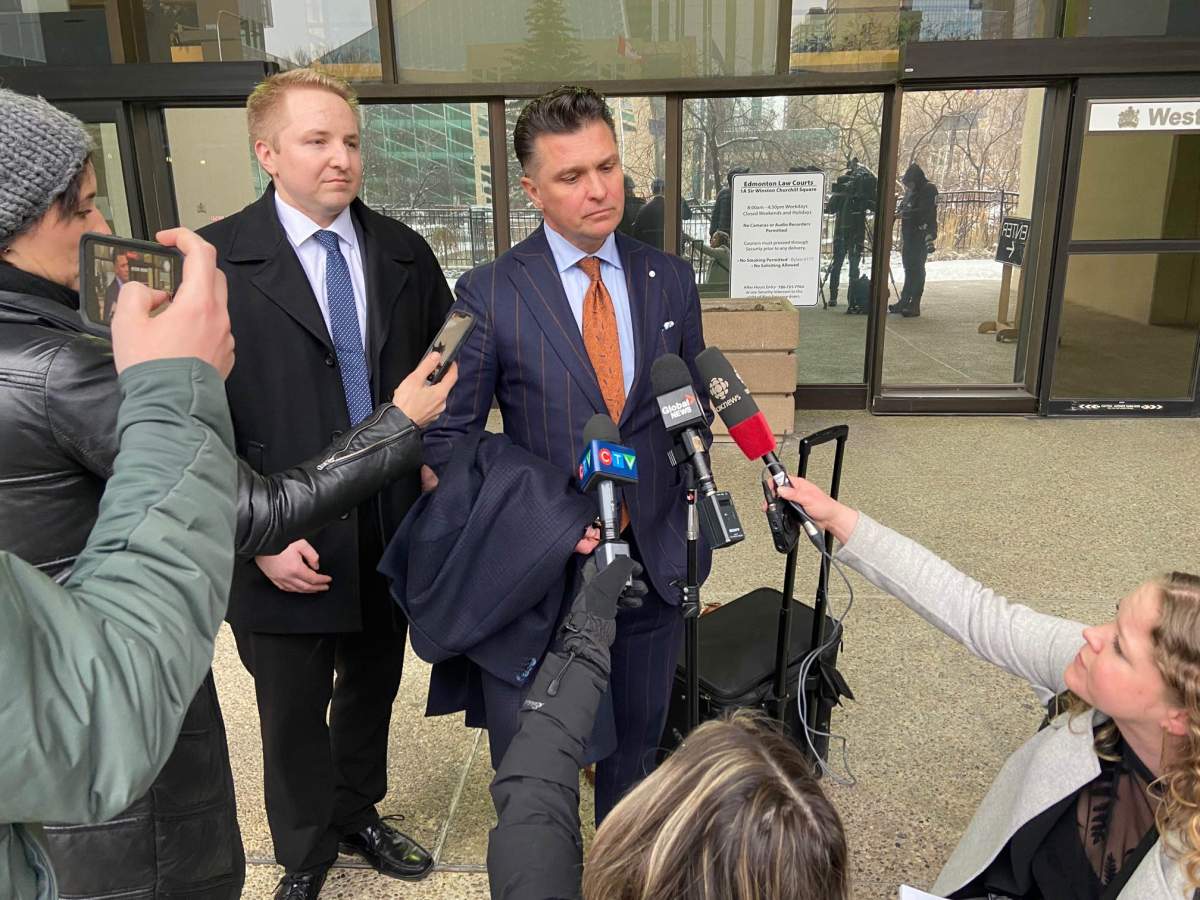 Crinimal defence lawyer Dino Bottos speaking to the media about the John de Ruiter case outside the Edmonton law courts on Friday, Jan. 27, 2023.