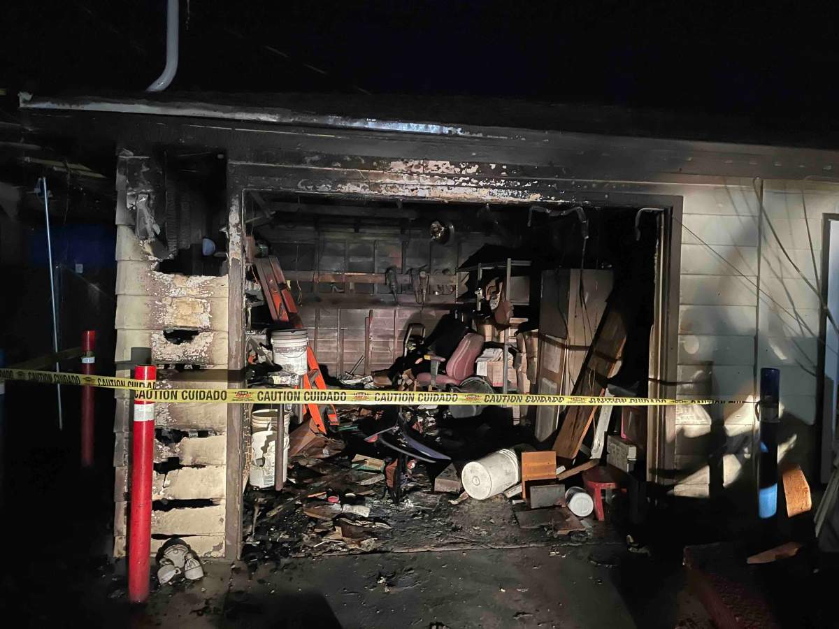 The damage to the garage of Servicio de Inmigracion in Bakersfield, California.