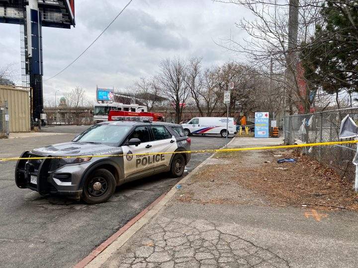 Emergency services on the scene of a fatal encampment fire reported near Liberty Village on Jan. 7, 2023.