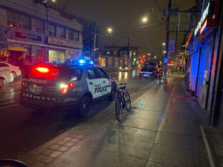 Toronto police on the scene of a collision between two vehicles in the area of Ossington Avenue and Dundas Street West.