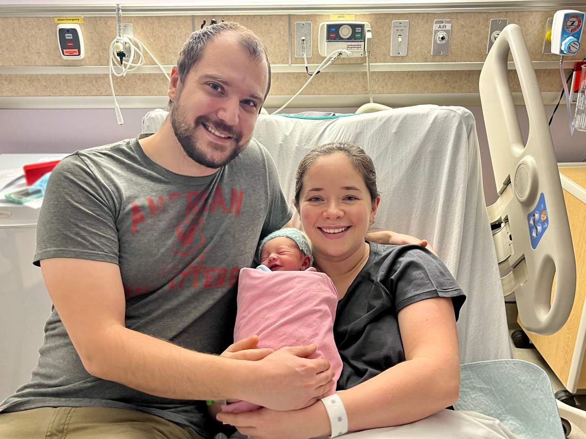 Baby Evelyn is welcomed by mom, Jennifer and dad, Michael.