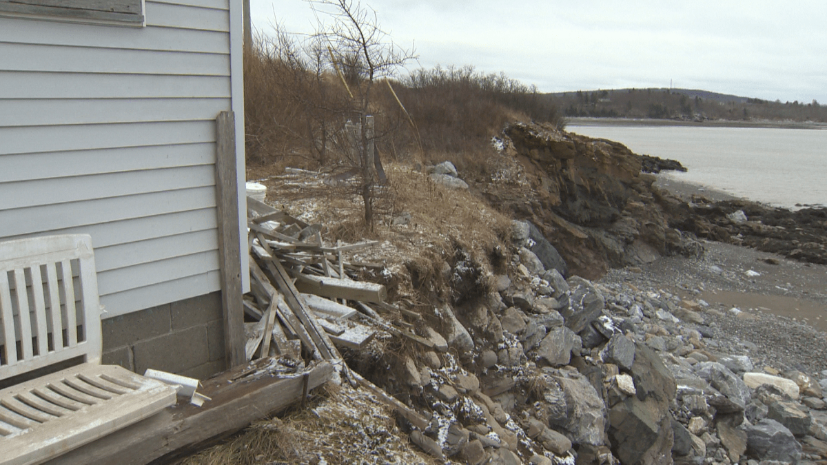 A winter storm wiped out much of Dana Bagley’s fence, leaving his shed on the edge of a cliff.