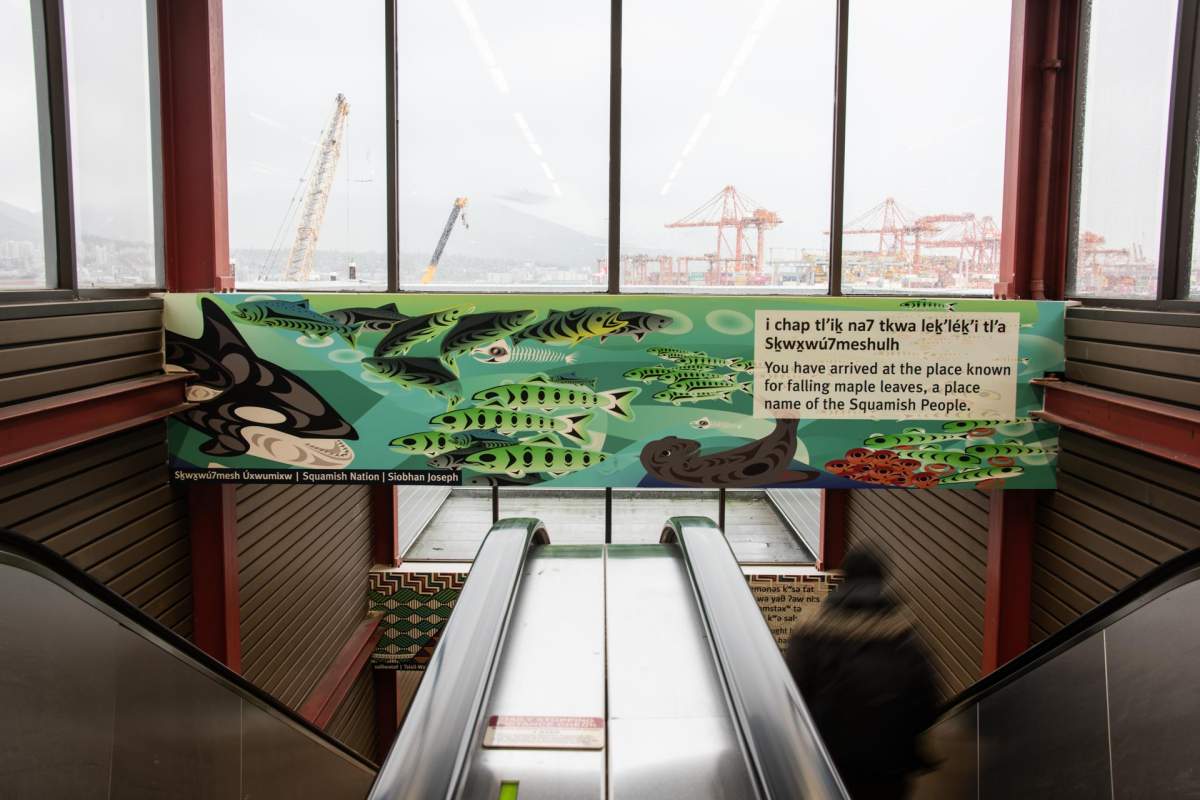 New signage at the Vancouver Waterfront Station pays tribute to Chinook salmon, a staple in First Nations livelihood and the ecosystem of the Burrard Inlet and Pacific Ocean.