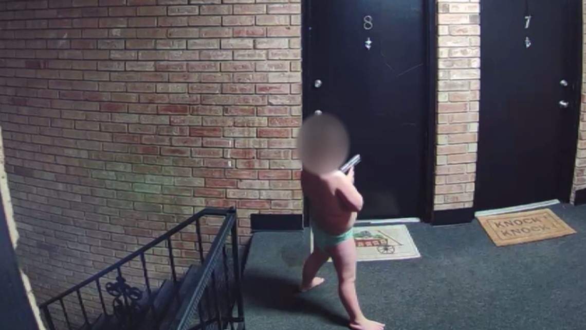 Video from the Beech Grove Police Department shows a 4-year-old boy holding a gun outside an apartment.