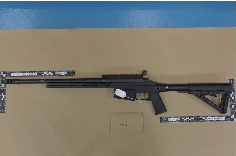 An assault rifle found by Calgary police as part of a monthlong investigation into drug trafficking and vehicle cloning.