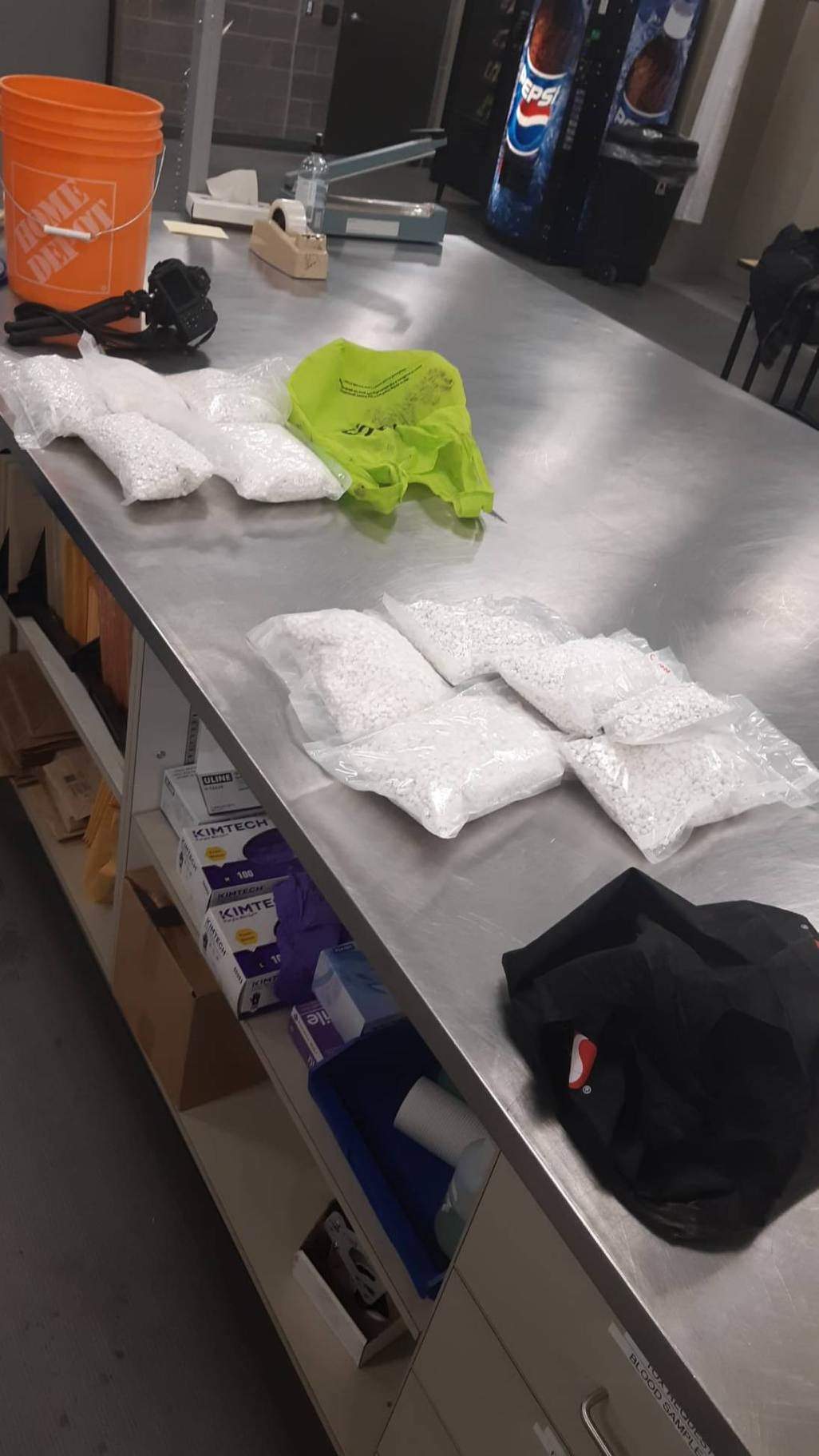 Tablets found by Calgary police as part of a monthlong investigation into drug trafficking and vehicle cloning.