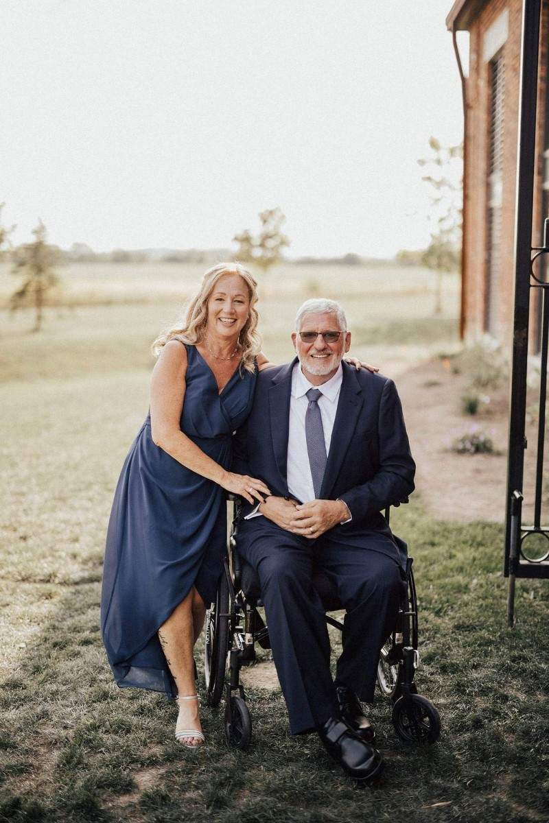 Jim Hamilton and his wife, Kathie, pose for a photo.
